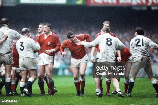 England and Bath prop Gareth Chilcott number 3 and Dean Richard number 8 have a altercation with some of the welsh team during the Wales v England...
