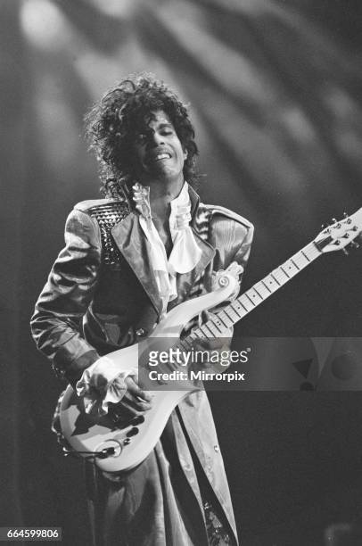 Prince performing on stage at the Joe Louis Arena, Chicago 11th November 1984. The Purple Rain Tour .