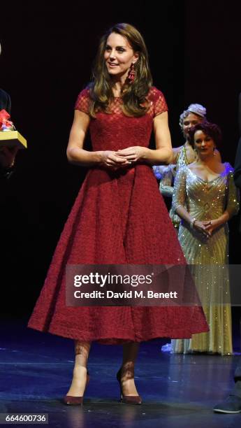 Catherine, Duchess of Cambridge, takes part in a presentation during the Opening Night Royal Gala performance of "42nd Street" in aid of the East...