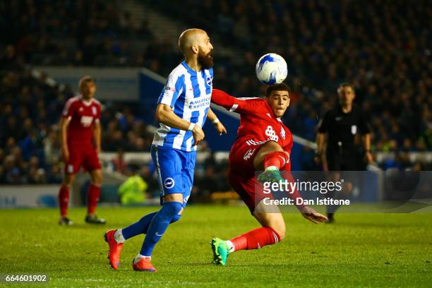Che Adams of Birmingham City battles for the ball with Bruno Saltor of Brighton & Hove Albion during the Sky Bet Championship match between Brighton...