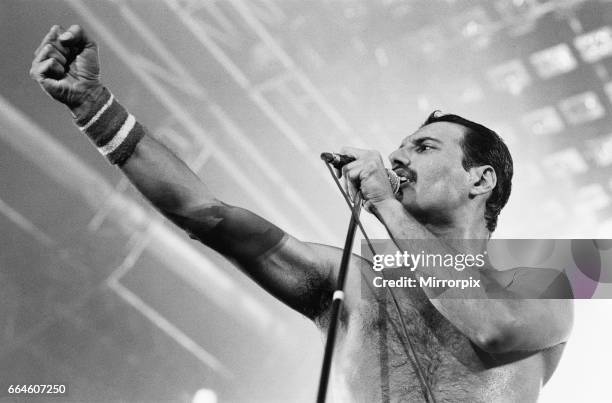 Rock group Queen in concert at Wembley Arena. Lead singer Freddie Mercury performing on stage on his 38th birthday. 5th September 1984.