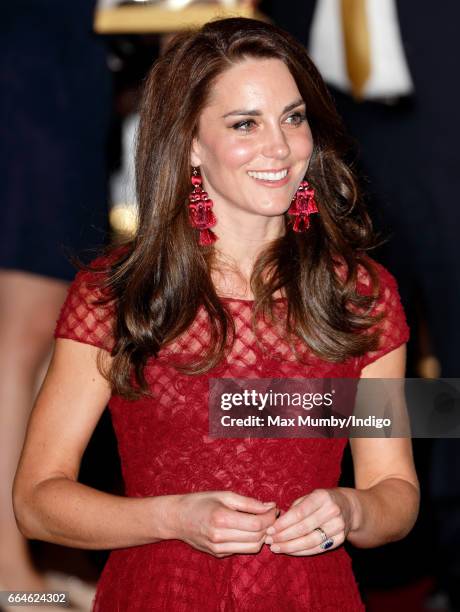 Catherine, Duchess of Cambridge departs after attending the opening night of '42nd Street' at the Theatre Royal on April 4, 2017 in London, England....