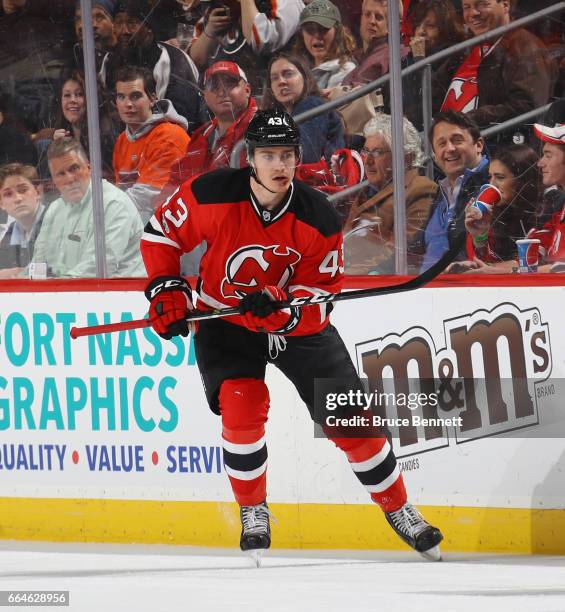 Ben Thomson of the New Jersey Devils skates in his first NHL game against the Philadelphia Flyers at the Prudential Center on April 4, 2017 in...