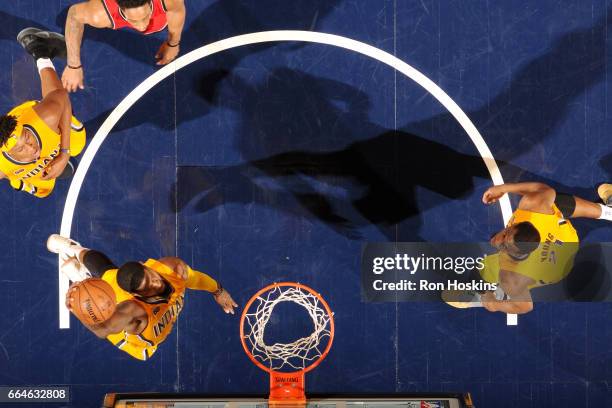 Paul George of the Indiana Pacers dunks the ball during the game against the Toronto Raptors on April 4, 2017 at Bankers Life Fieldhouse in...