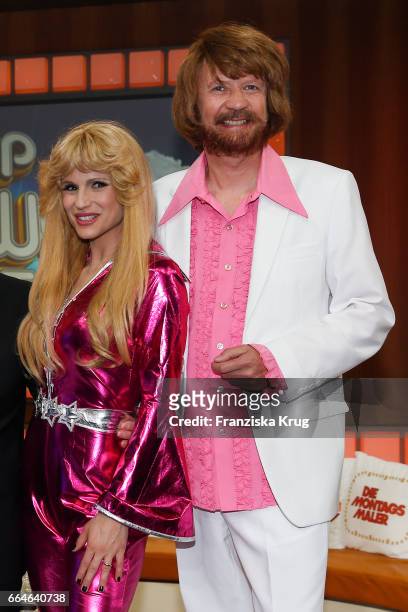 Michelle Hunziker and Guenther Jauch, dressed as members of the Swedish band ABBA, during the photo call for TV Show 'Top, die Wette gilt! 75 Jahre...