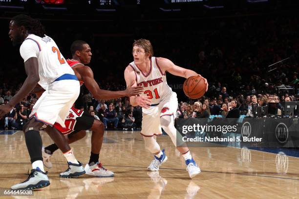 Ron Baker of the New York Knicks handles the ball against the Chicago Bulls on April 4, 2017 at Madison Square Garden in New York City, New York....