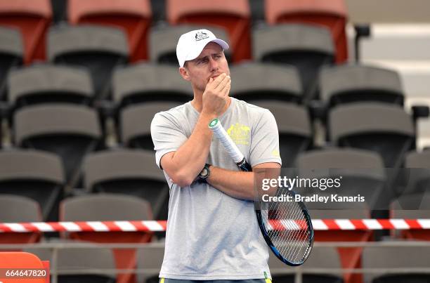 Team Captain Lleyton Hewitt of Australia ponders as he watches on during practice ahead of the Davis Cup World Group Quarterfinal match between...