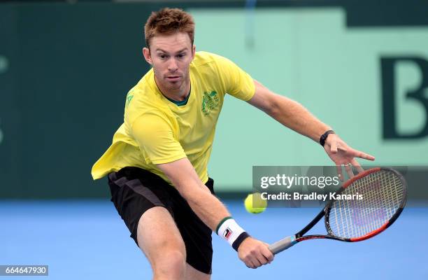 John Peers of Australia plays a backhand volley during practice ahead of the Davis Cup World Group Quarterfinal match between Australia and the USA...