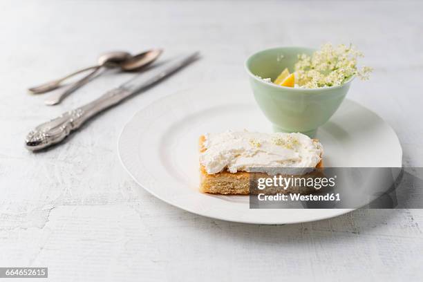 lemon cake with elder curd cream - lemon cake stock pictures, royalty-free photos & images
