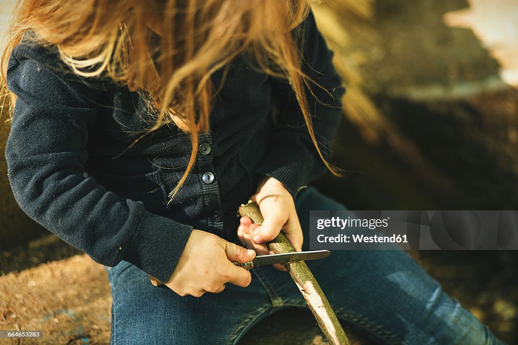 Girl in forest carving