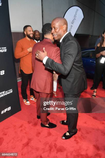 Ludacris and Tyrese Gibson attend "The Fate Of The Furious" Atlanta red carpet screening at SCADshow on April 4, 2017 in Atlanta, Georgia.