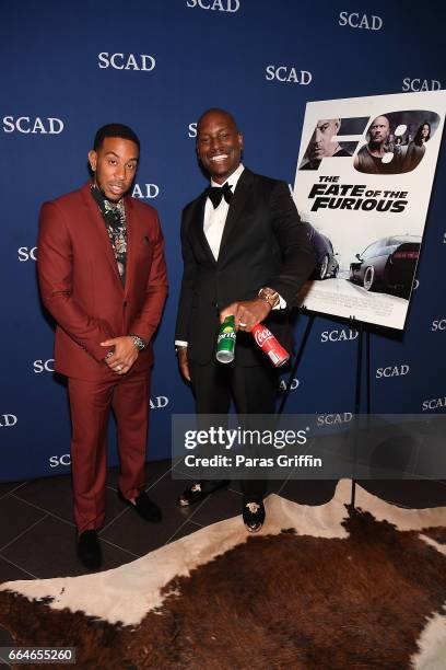 Ludacris and Tyrese Gibson attend "The Fate Of The Furious" Atlanta red carpet screening at SCADshow on April 4, 2017 in Atlanta, Georgia.