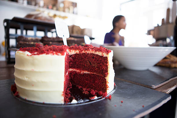 red velvet cake on cafe counter - red velvet cake stock pictures, royalty-free photos & images