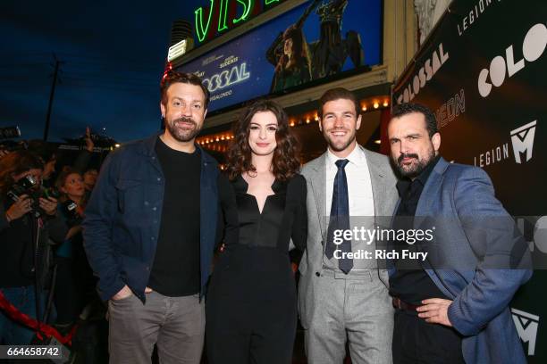 Actor Jason Sudeikis, actress Anne Hathaway, actor Austin Stowell and director Nacho Vigalondo arrive at the premiere of Neon's "Colossal" at the...