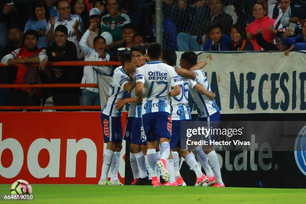 Franco Jara of Pachuca celebrates with teammates after scoring the first goal of his team during the semifinals second leg match between Pachuca and...