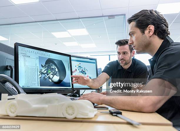 engineers work with cad design imagery in racing car factory - conversation car bildbanksfoton och bilder