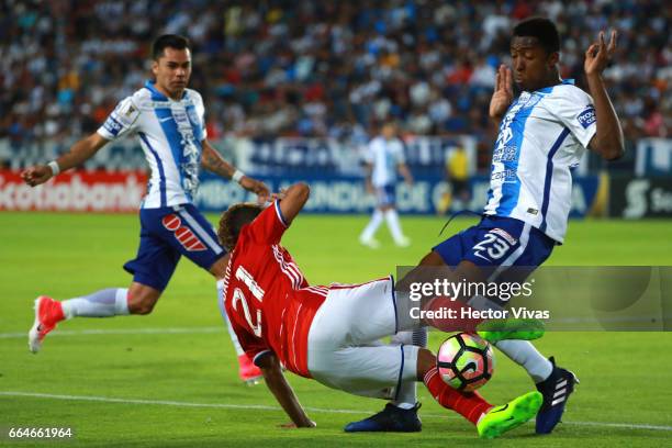 Oscar Murillo of Pachuca struggles for the ball with Michael David Barrios of FC Dallas during the semifinals second leg match between Pachuca and FC...