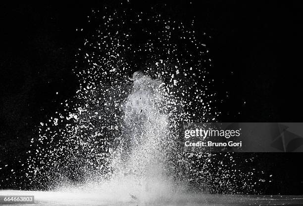 Exploding Break Break Through Particles Photos and Premium High Res Pictures - Getty Images
