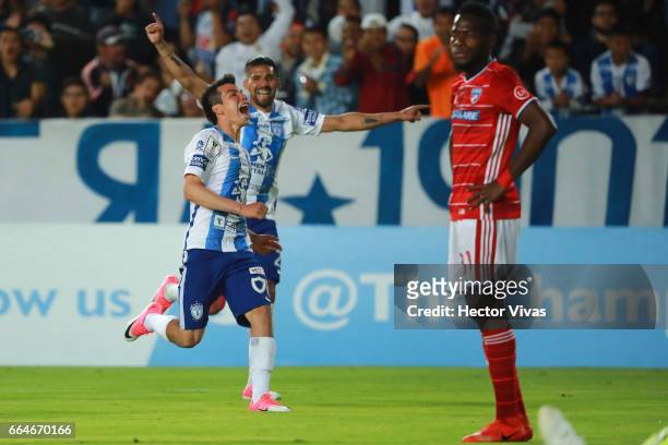 Hirving Lozano of Pachuca celebrates after scoring the third and winning goal of his team during the semifinals second leg match between Pachuca and...