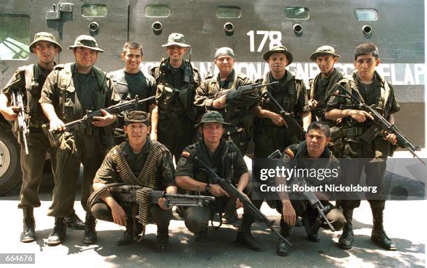 Federal police unit poses for a picture in front of their armored personnel carrier August 21, 2000 in Barrancabermeja, Colombia. Barrancabermeja has...