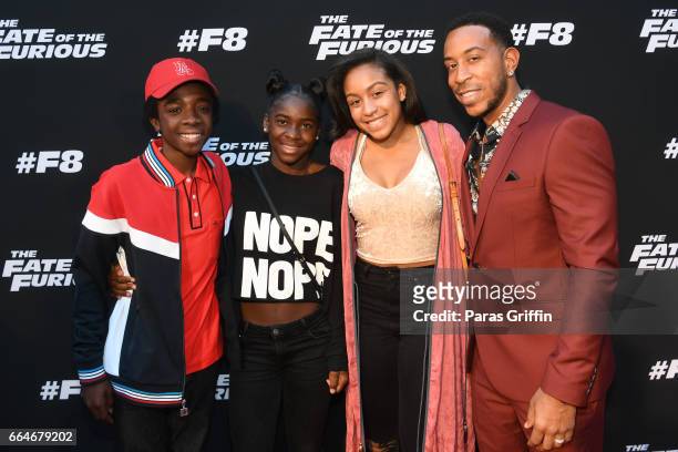 Caleb McLaughlin, Karma Bridges, and Ludacris attend The Fate Of The Furious Atlanta Red Carpet Screening at SCADshow on April 4, 2017 in Atlanta,...