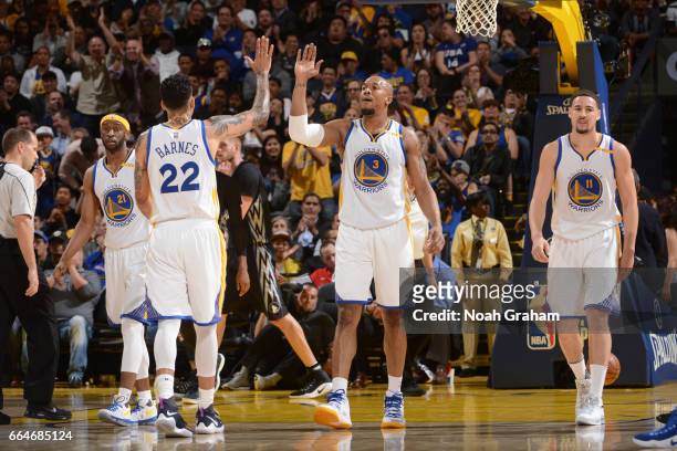 David West and Matt Barnes of the Golden State Warriors react to a play during a game against the Minnesota Timberwolves on April 4, 2017 at ORACLE...