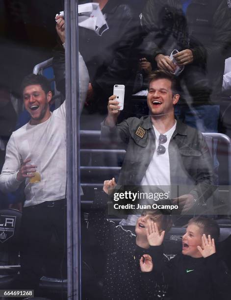 Niall Horan of One Direction watches the game between the Los Angeles Kings and the Edmonton Oilers on April 4, 2017 at Staples Center in Los...
