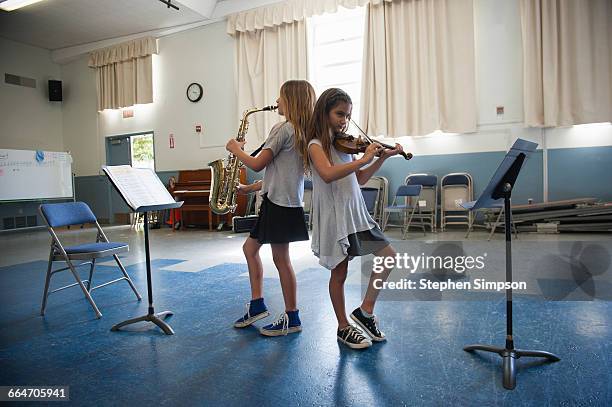 Practicing Instruments Group Child Playing Sax Photos and Premium High Res Pictures - Getty Images