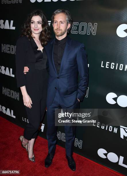 Anne Hathaway, Adam Shulman arrives at the Premiere Of Neon's "Colossal" at the Vista Theatre on April 4, 2017 in Los Angeles, California.