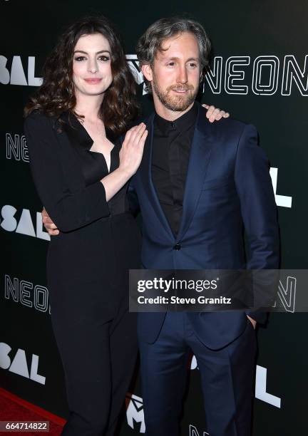 Anne Hathaway, Adam Shulman arrives at the Premiere Of Neon's "Colossal" at the Vista Theatre on April 4, 2017 in Los Angeles, California.