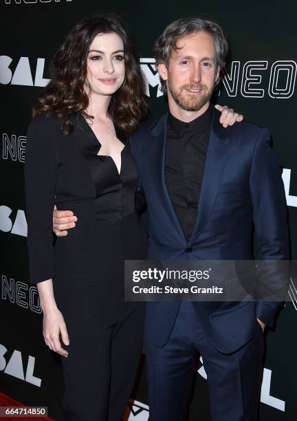 Anne Hathaway, Adam Shulman arrives at the Premiere Of Neon's "Colossal" at the Vista Theatre on April 4, 2017 in Los Angeles, California.