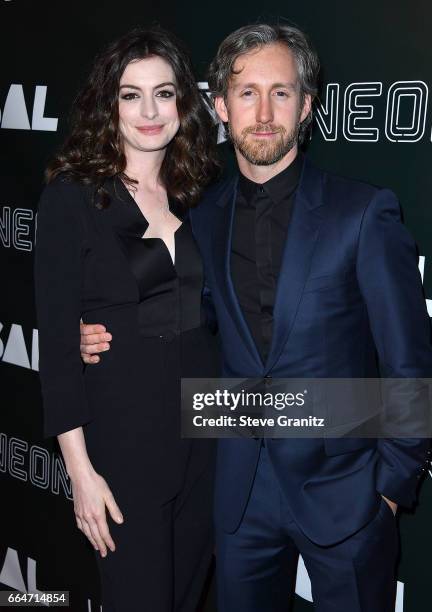 Anne Hathaway, Adam Shulman arrives at the Premiere Of Neon's "Colossal" at the Vista Theatre on April 4, 2017 in Los Angeles, California.