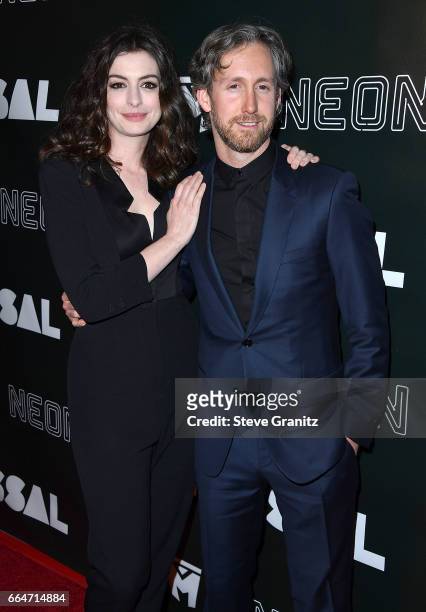 Anne Hathaway, Adam Shulman arrives at the Premiere Of Neon's "Colossal" at the Vista Theatre on April 4, 2017 in Los Angeles, California.