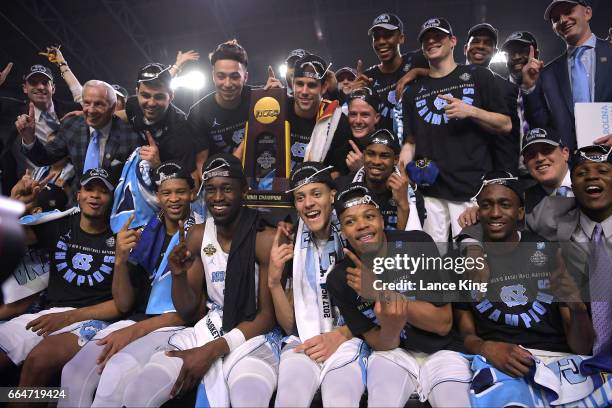 Players and coaches of the North Carolina Tar Heels celebrate following their 71-65 victory against the Gonzaga Bulldogs during the 2017 NCAA Men's...