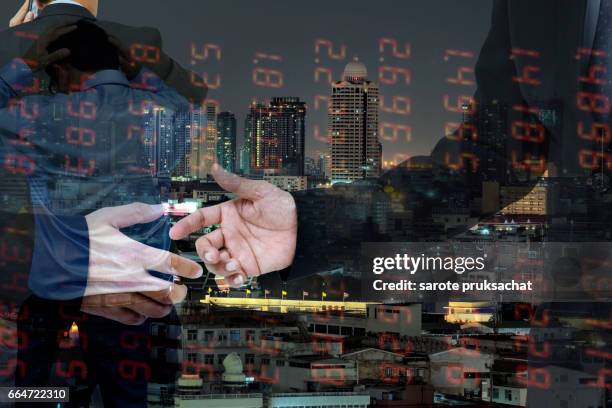 double exposure of   businessman groups hand shake for business and technical bar chart  background. - candlestick phone - fotografias e filmes do acervo