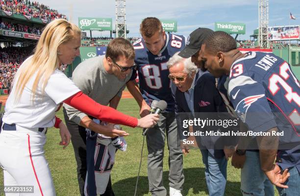 Tom Brady, Rob Gronkowski, Robert Kraft, James White and Dion Lewis of the New England Patriots yell "play ball" at Fenway Park before an opening gay...