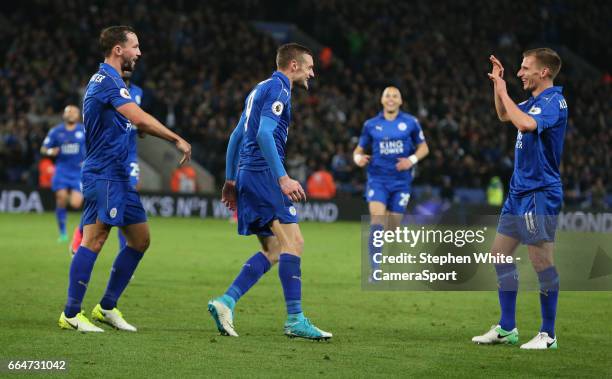 Leicester City's Jamie Vardy celebrates scoring his sides second goal with team-mate Marc Albrighton during the Premier League match between...