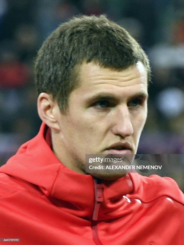 Vasin Russia's Viktor Vasin listens to the national anthem prior to an ...