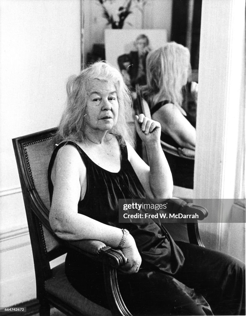Alice Artist Portrait of American artist Alice Neel as she sits in a chair, in ...
