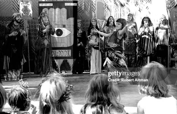 Little girl belly dances during the Black Point Renaissance Pleasure Faire circa August, 1974 in San Francisco, California.