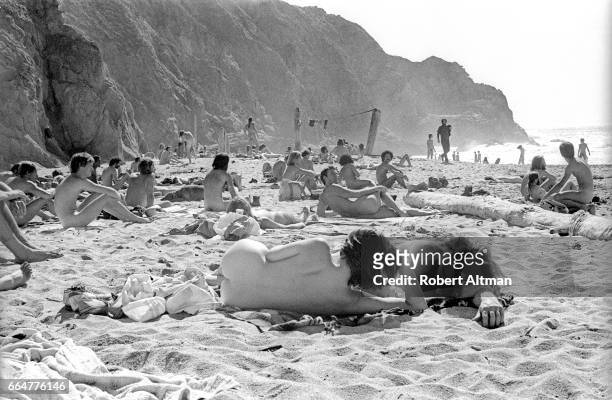 Nudist sunbathe at the Devil's Slide Free Beach in San Mateo County circa October, 1974 south of San Francisco, California.