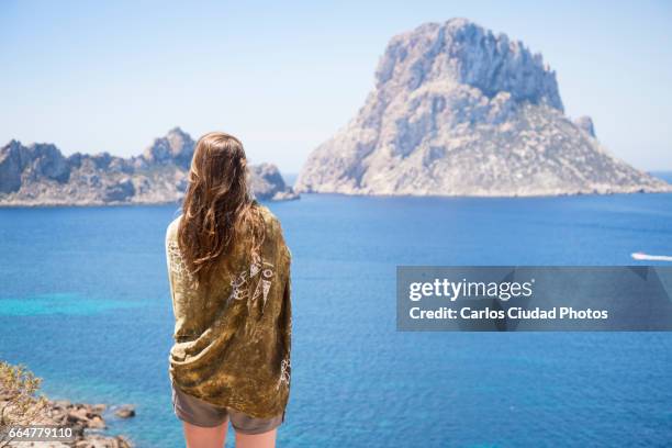 young woman looking the isle of es vedra, ibiza, spain - ibiza hippie bildbanksfoton och bilder