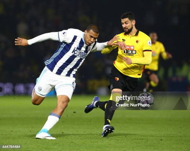 West Bromwich Albion's Salomon Rondon and Watford's Miguel Angel Britos during EPL - Premier League match between Watford against West Bromwich...