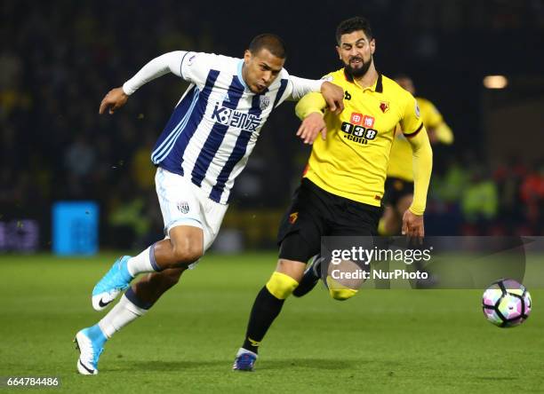 West Bromwich Albion's Salomon Rondon and Watford's Miguel Angel Britos during EPL - Premier League match between Watford against West Bromwich...