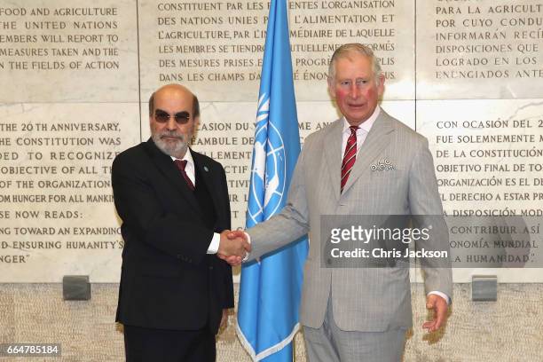 Prince Charles, Prince of Wales is greeted by Director General Jose Graziano da Silva during a visit to the Headquarters of the United Nations Food...