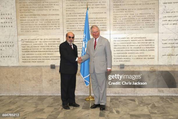 Prince Charles, Prince of Wales is greeted by Director General Jose Graziano da Silva during a visit to the Headquarters of the United Nations Food...