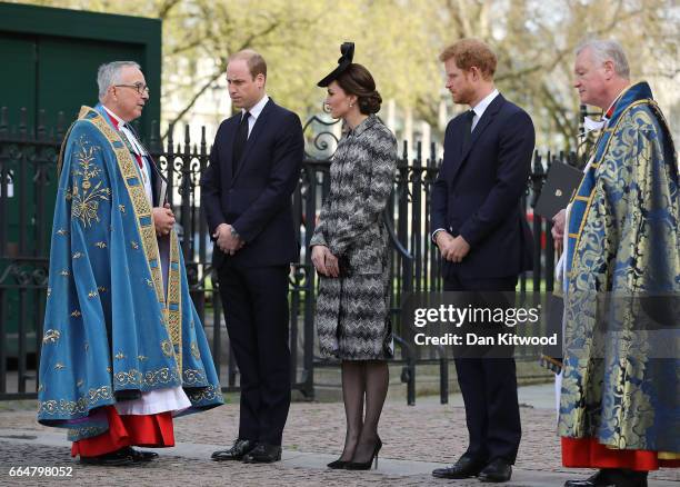 The Very Reverend Dr John Hall, Dean of Westminster speaks with Prince William, Duke of Cambridge, Catherine, Duchess of Cambridge and Prince Harry...