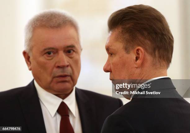 Gazprom's CEO Alexei Miller and Lukoip President Vagit Alekperov attend the welcoming ceremony at the Grand Kremlin Palace on April 5, 2017 in...