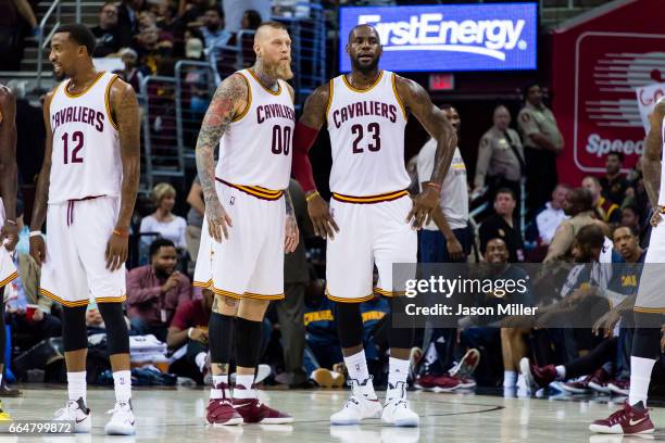 Chris Andersen of the Cleveland Cavaliers and LeBron James on the court during the first half of a preseason game against the Orlando Magic at...