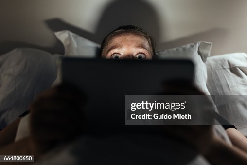 Woman using home tablet pc. Woman using home tablet pc.